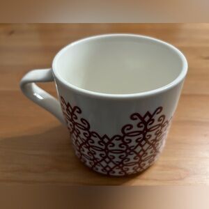 Starbucks coffee mug with red design